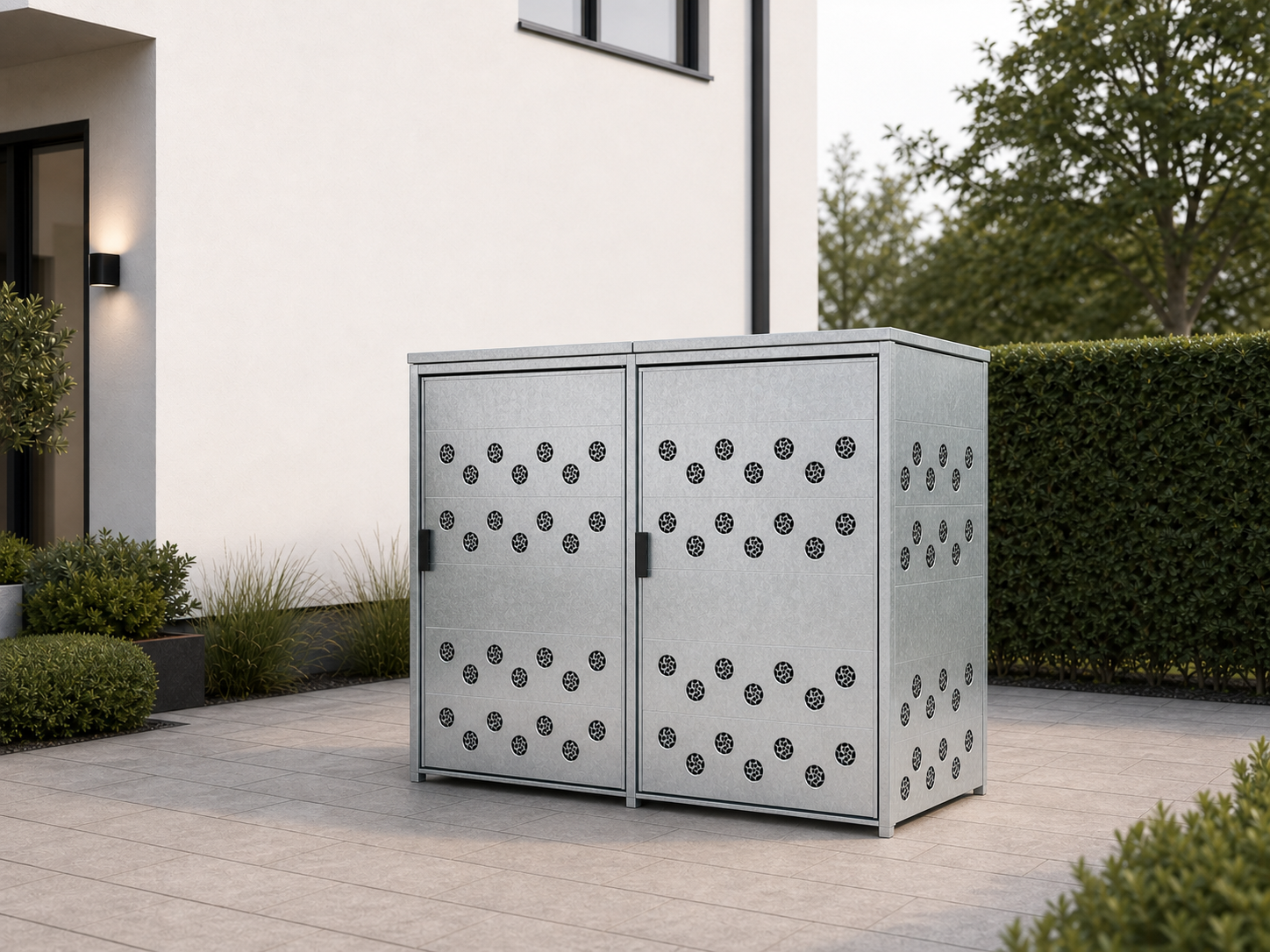 Verzinkte Mülltonnenbox vor einem modernen Wohnhaus